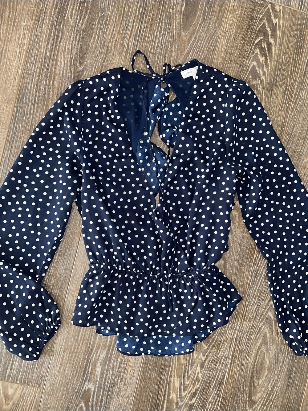 emory park Navy and White Polka Dot Tie-Neck Ruffle Blouse